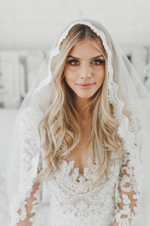 Mantilla Veil - This is a traditional Spanish veil, framed with lace around the edges.  | www.rossiniweddings.com