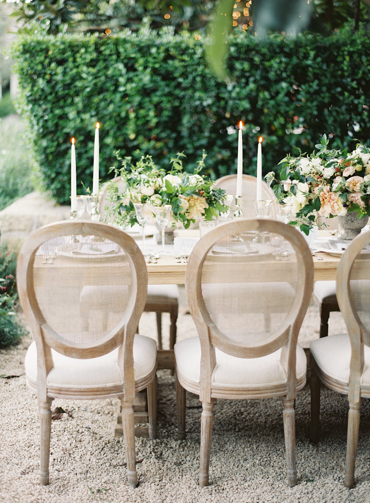 The antique-inspired caned back chair