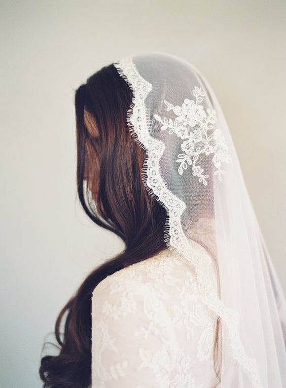 Mantilla Veil - This is a traditional Spanish veil, framed with lace around the edges.  | www.rossiniweddings.com